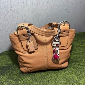 Coach soho tote purse tan black white red cherry trigger snap bag charm